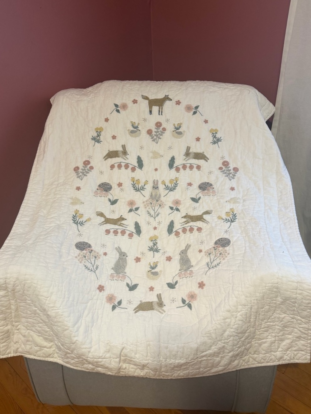 Embroidered White Crib Quilt with Pastel Woodland Animals